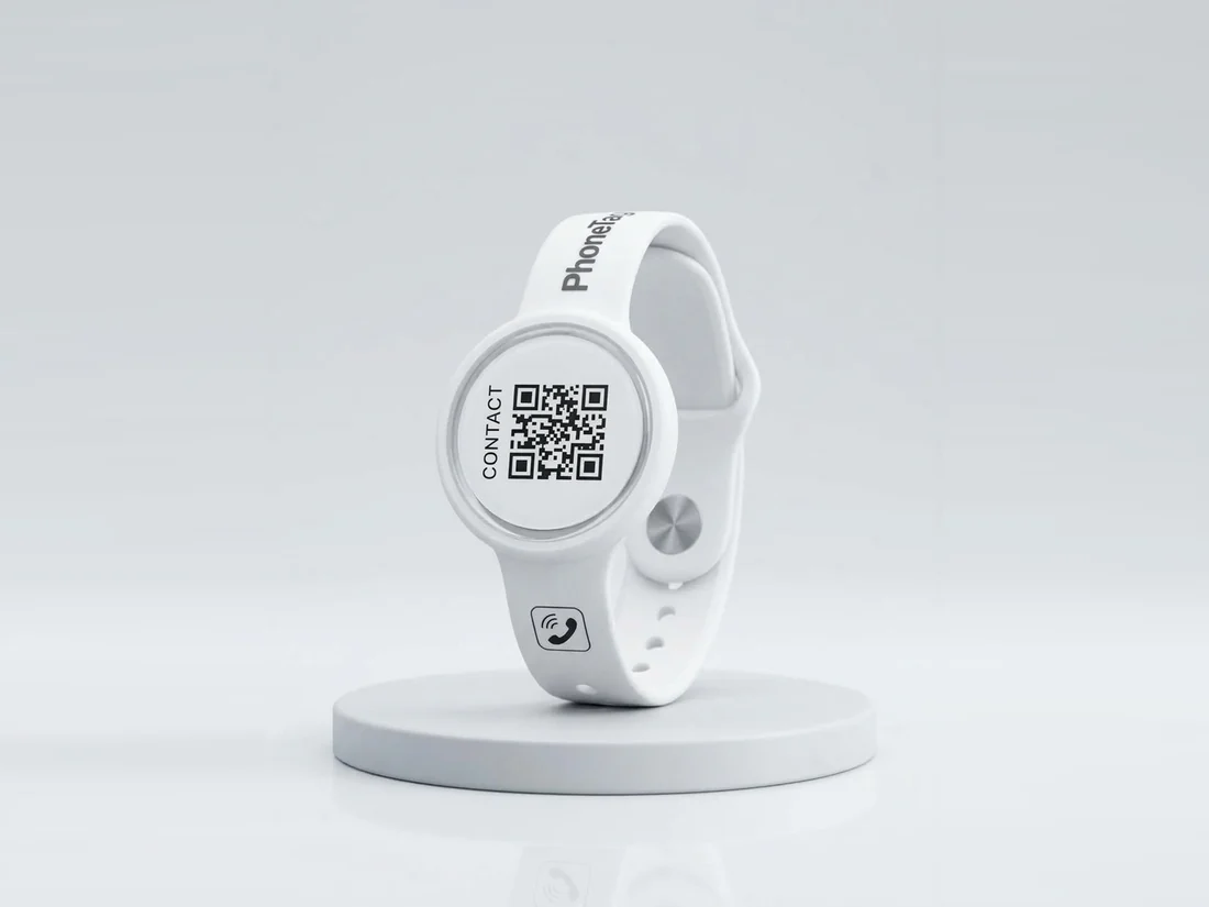 The PhoneTag Smart Band in White on a stand