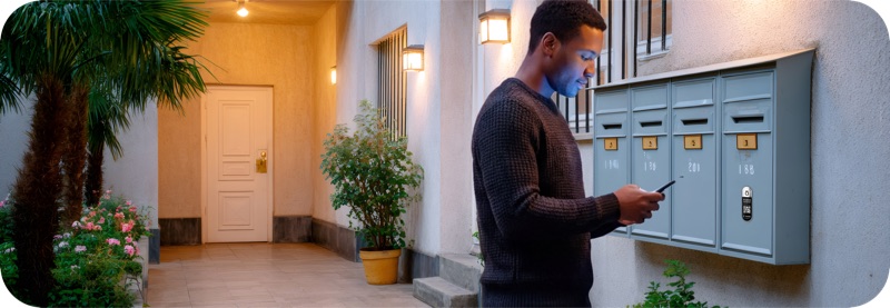 An apartment building entrance where a PhoneTag Intercom works on any door