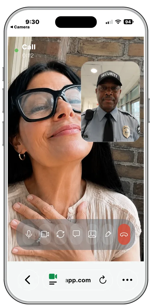 A parent on a live PhoneTag video call with a uniformed security guard who scanned their child&rsquo;s tag